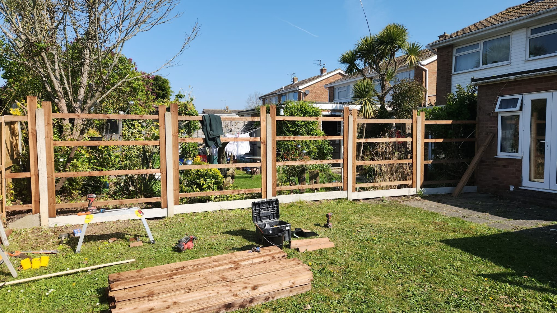 Fence framework with horizontal rails being fixed between concrete posts
